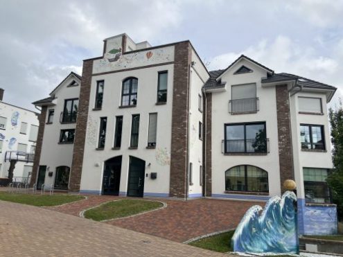 Praxis Seezeit Eingang mit Welle